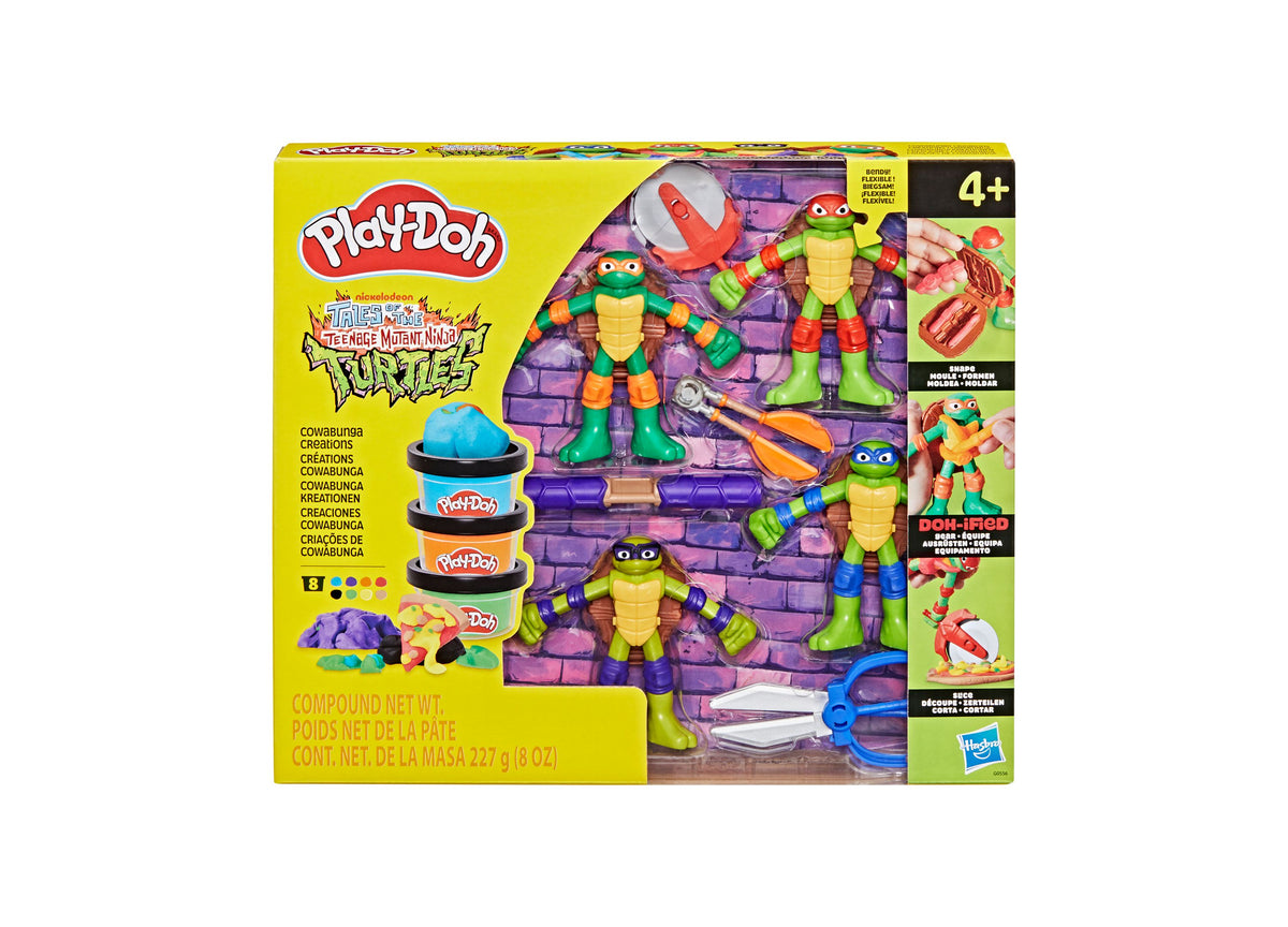 Play-Doh TMNT Cowabunga Creations playset with four colorful Ninja Turtle figures, purple brick backdrop, Play-Doh to...
