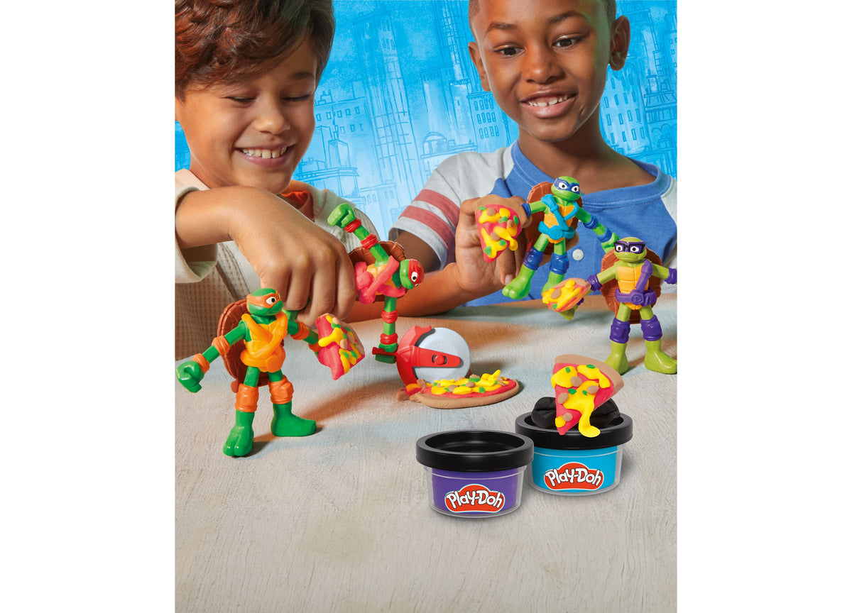 Play-Doh TMNT Cowabunga Creations playset with four colorful Ninja Turtle figures, Play-Doh tools, and cans of modeli...