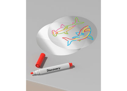 Discovery Kids Doodle Projector Light Art Station with colorful shark drawings and red dry-erase marker