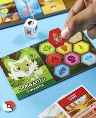 Pokémon Monopoly Edition Board Game with colorful hexagonal tokens, dice, and Sprigatito character card displayed on ...