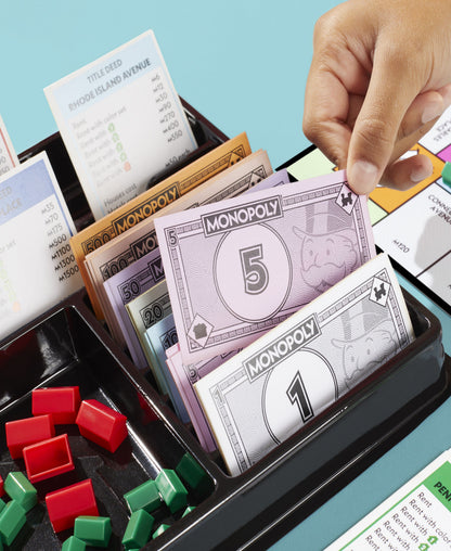 Monopoly Classic Edition Fun Family Board Game with colorful play money, red and green property cards, and game board...