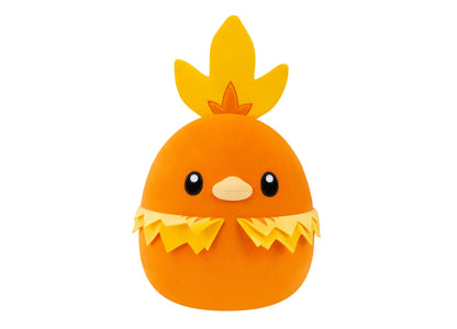 Orange plush toy with yellow crown-like leaves on head, black eyes, cream-colored beak, and yellow ruffled collar detail