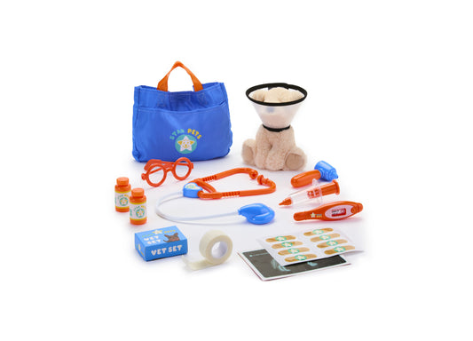 Star Pets Vet Care Playset with blue carrying bag, plush cream-colored pet, stethoscope, glasses, bottles, syringe, thermometer, tape, instruction booklet, and