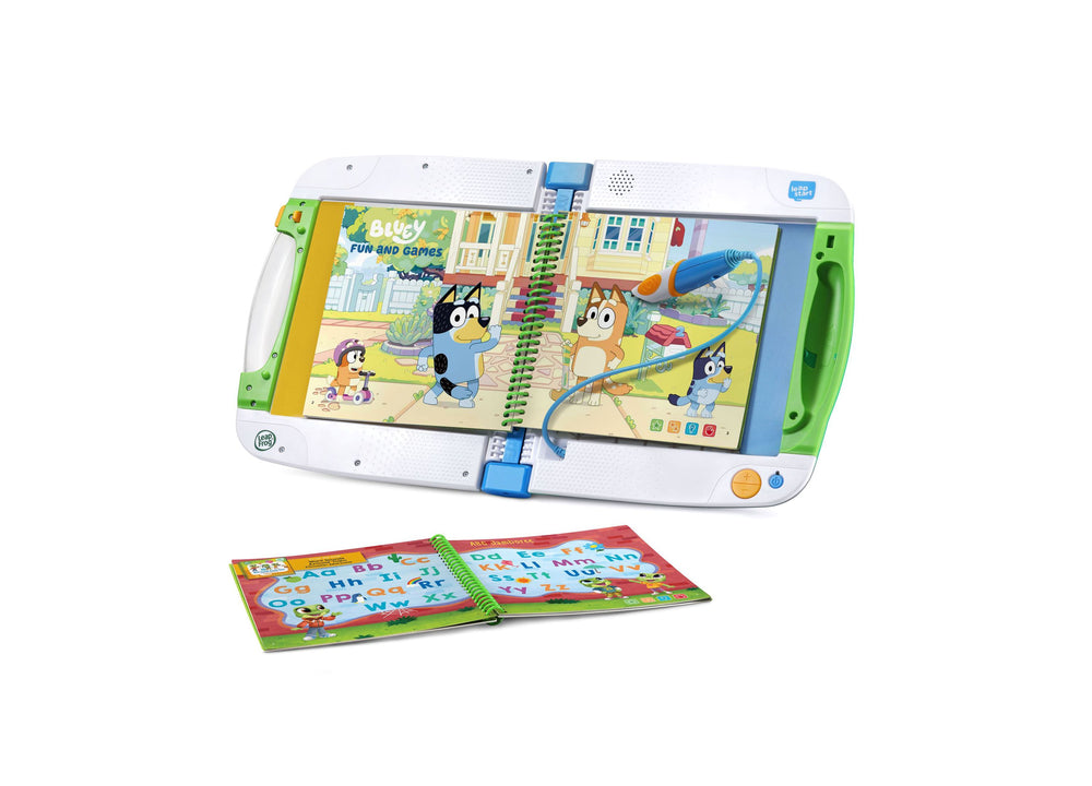 LeapFrog LeapStart interactive learning device with Bluey characters on screen and colorful activity book showing letters and words