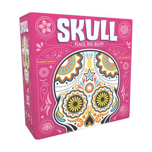 Skull board game box with pink background, colorful sugar skull design, titled 'Skull Place, Bid, Bluff' by Hervé Marly