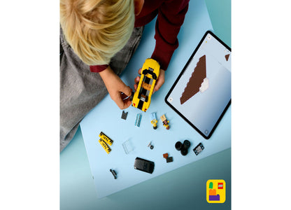 LEGO City Yellow Taxi Car 60487 building set with 122 pieces displayed with minifigures and components