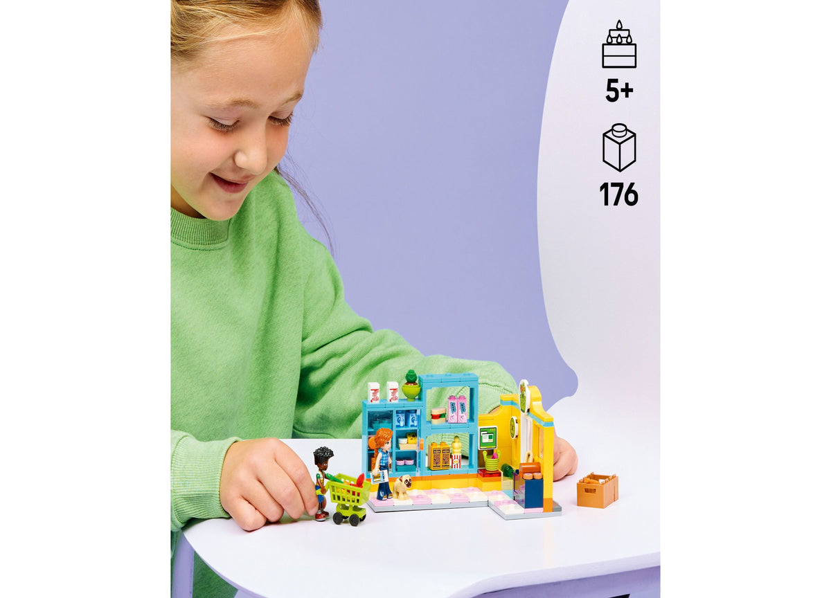 LEGO Friends Heartlake City Convenience Store with blue storefront, yellow door, shelves, checkout counter, minidolls...