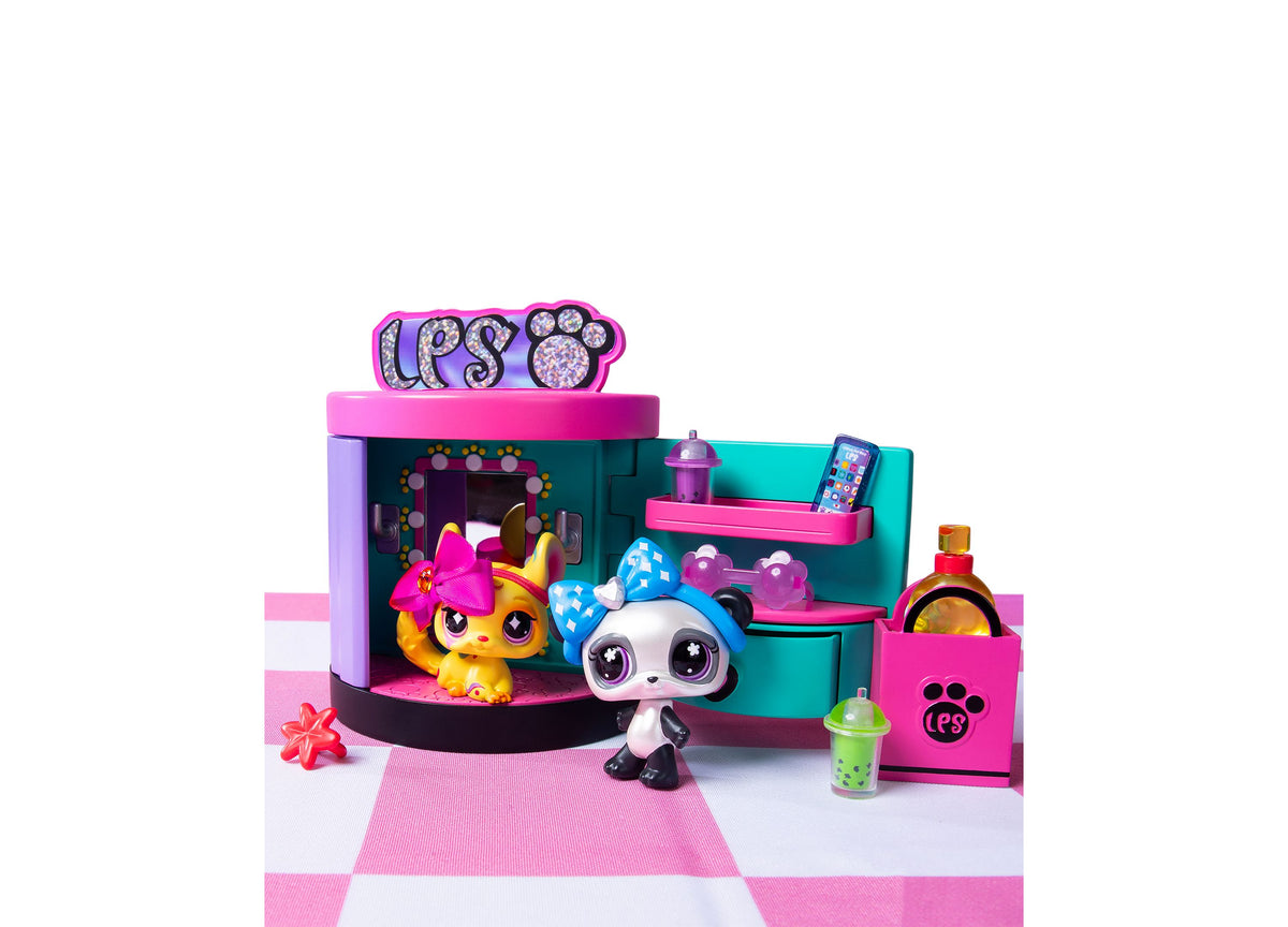 Littlest Pet Shop Spin and Style Boutique Playset with pink and teal station, panda and raccoon pets, and fashion acc...