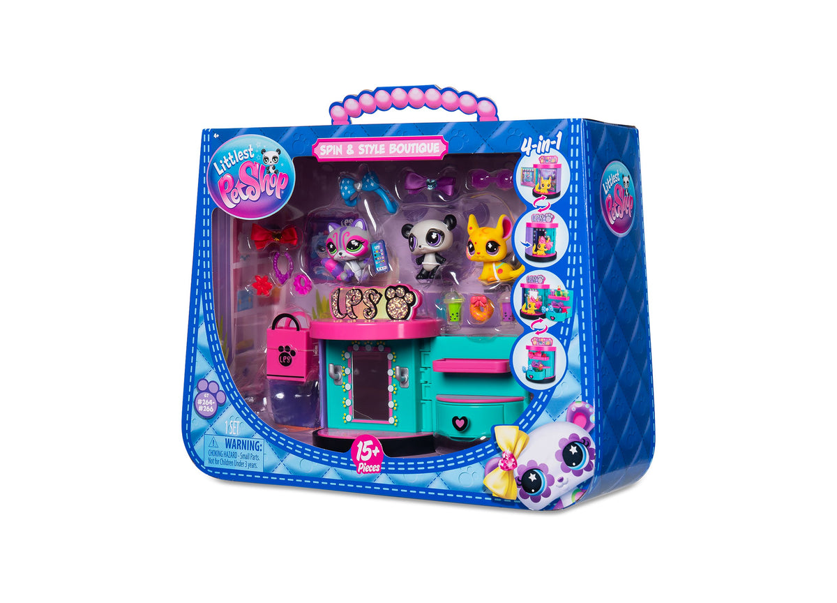 Littlest Pet Shop Spin and Style Boutique Playset with turquoise and pink boutique station, three pet characters, and...