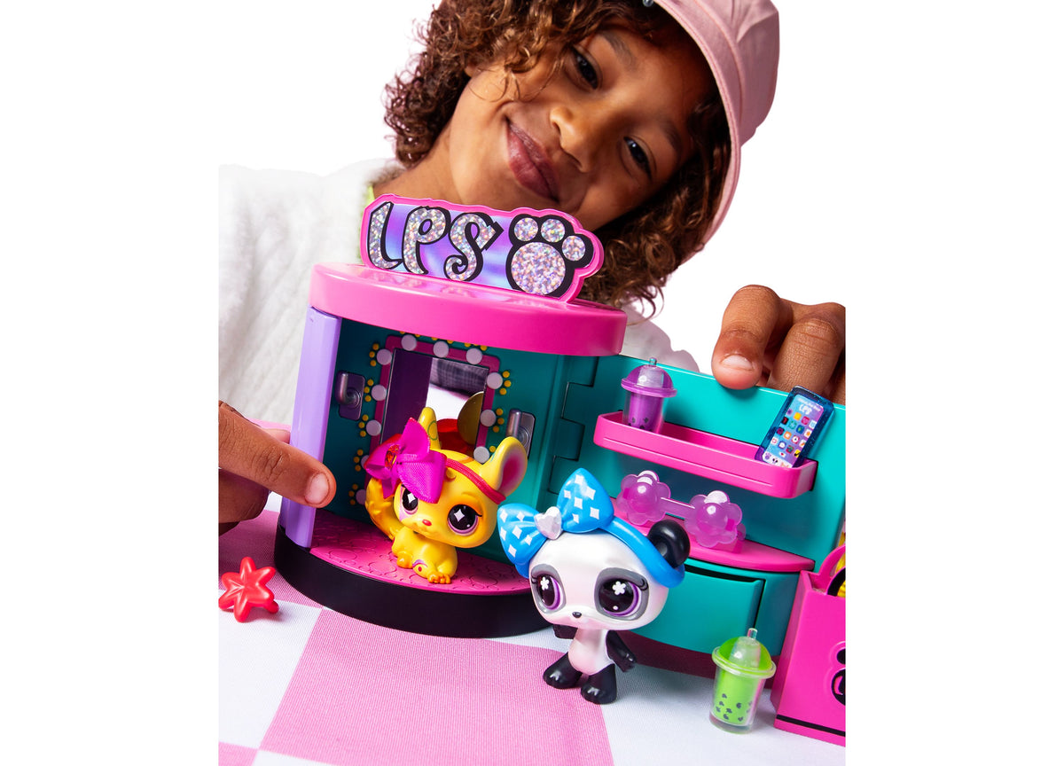 Littlest Pet Shop Spin and Style Boutique Playset with pink and teal station, yellow pet, panda character, and access...