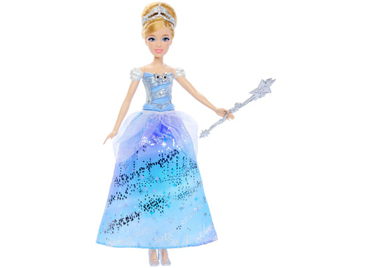 Disney Princess Cinderella doll with blonde hair, tiara, and blue ball gown with sparkle details, holding a silver wand, on plain white background