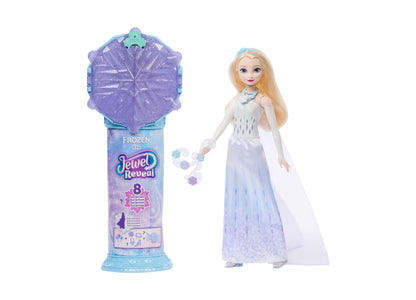 Frozen Jewel Reveal Elsa Fashion Doll with purple jewel-shaped case and accessories including small gem pieces
