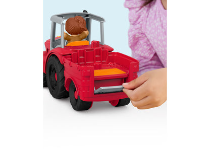 Fisher Price Little People Tractor playset with red farm vehicle and brown-haired figure