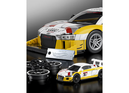 Mattel Hot Wheels Audi R8 LMS 820-piece building toy kit with yellow and white race car