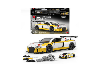 Mattel Hot Wheels Brick Shop Audi R8 LMS 820-piece building set with yellow and white car, wheels, and accessories