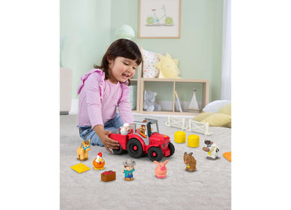 Fisher Price Little People tractor playset with red farm vehicle, figures, and accessories