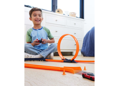 Hot Wheels Ferrari SF90 remote control car with orange track loop and ramp set