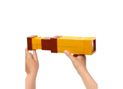 Minecraft Pixel Spyglass Role-Play Toy in yellow and brown held in hands