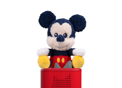 Tonies Cuddle Tonies Mickey Mouse plush character in black, cream, yellow and red, sitting in red storage box