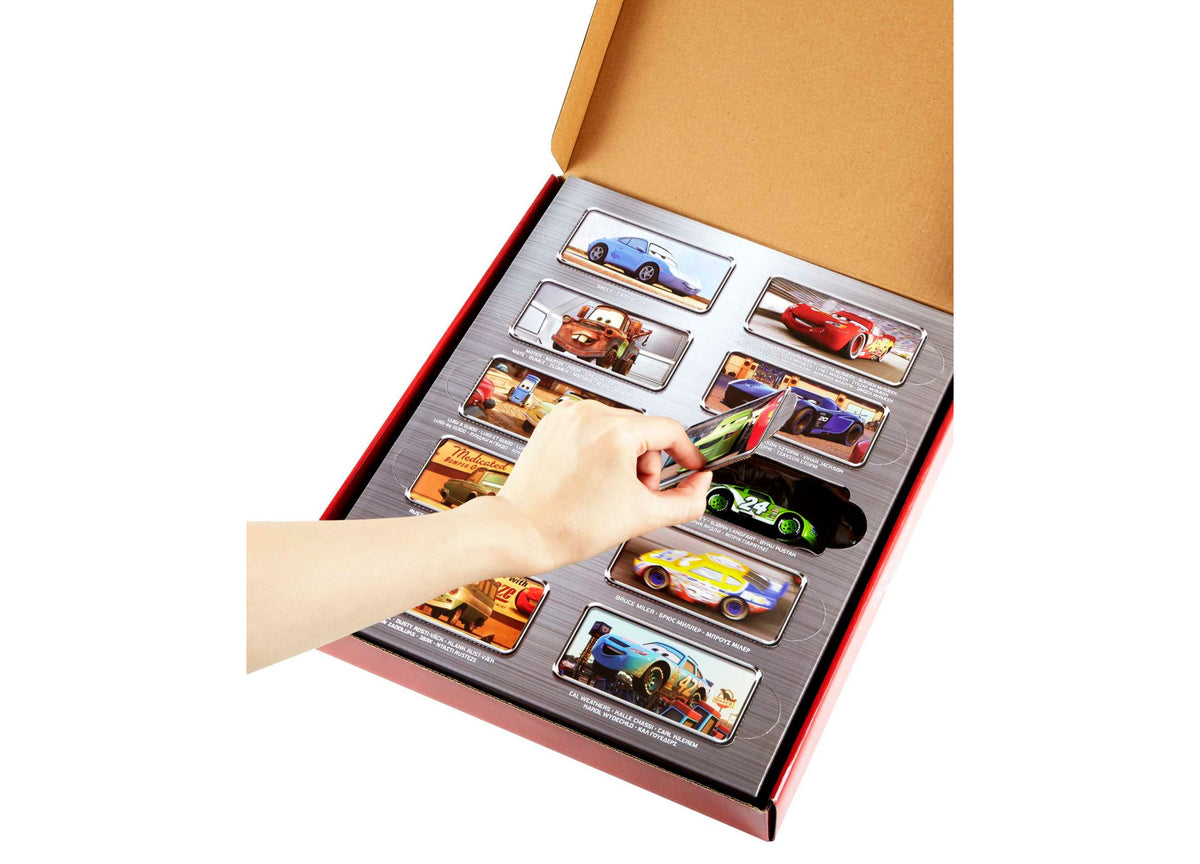 Disney Pixar Cars Mini Racers Die-Cast Vehicle 10-Pack display box with hand selecting a green race car from grid of ...