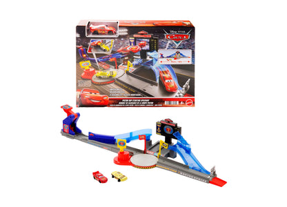 Disney Pixar Cars Stunting Speedway Playset with launcher, ramp, and two die-cast cars included