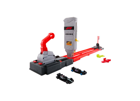 Hot Wheels Racing Formula 1 Grid Start Track Set with red launcher, gray tower, and two black race cars