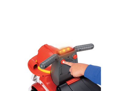 Paw Patrol Marshall red ride-on toy with light-up siren and black handlebar controls