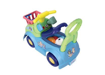 Bluey Shopping Cart Ride-On toy in blue, green and yellow with interactive features