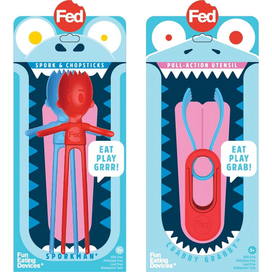 Two Fed Fun Eating Devices in packaging: red spork and chopsticks on left, red pull-action crabby grabber utensil on right, both with monster character design a