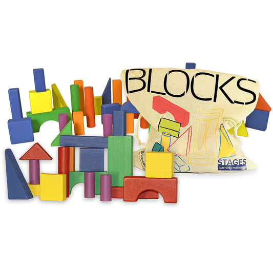 Stages Learning Materials Sensory Builder Blocks 50-piece set with colorful wooden blocks in various shapes and sizes next to cream storage bag