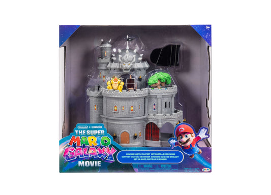 Super Mario Galaxy Movie Bowser Castle playset with gray stone castle structure, featuring yellow Bowser figure, green tree, red doors, and character accessorie