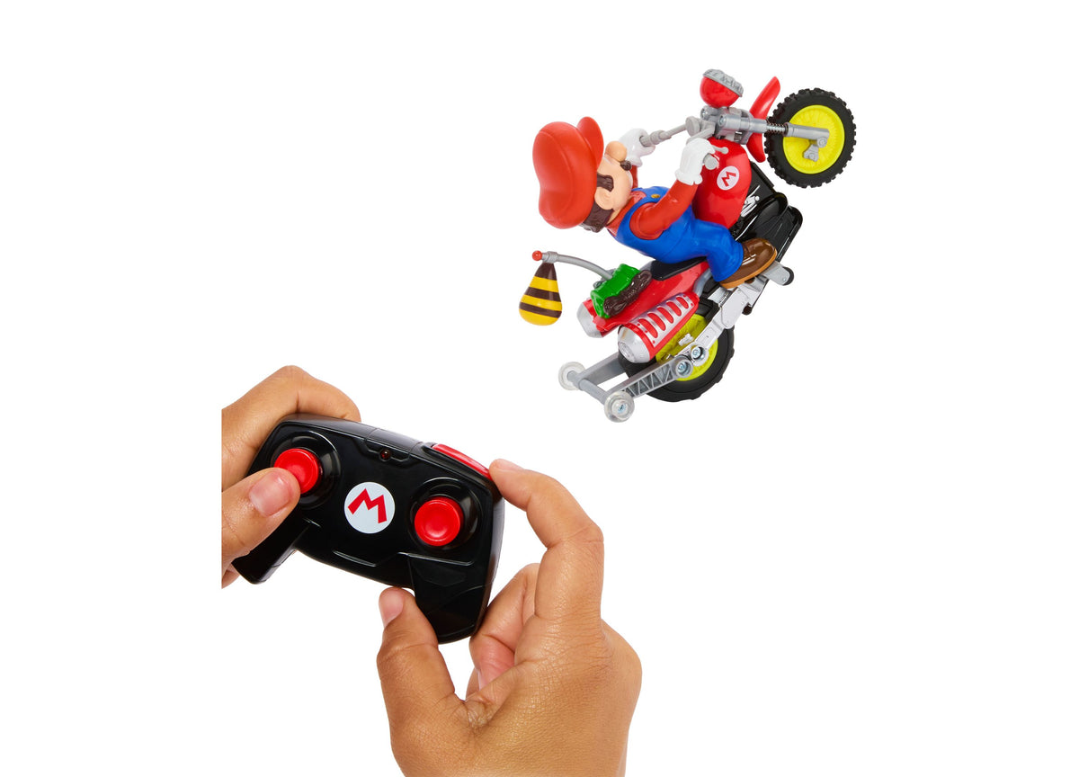 Hot Wheels Mario Wheelie Motocross RC Vehicle with remote control and character figure performing stunt