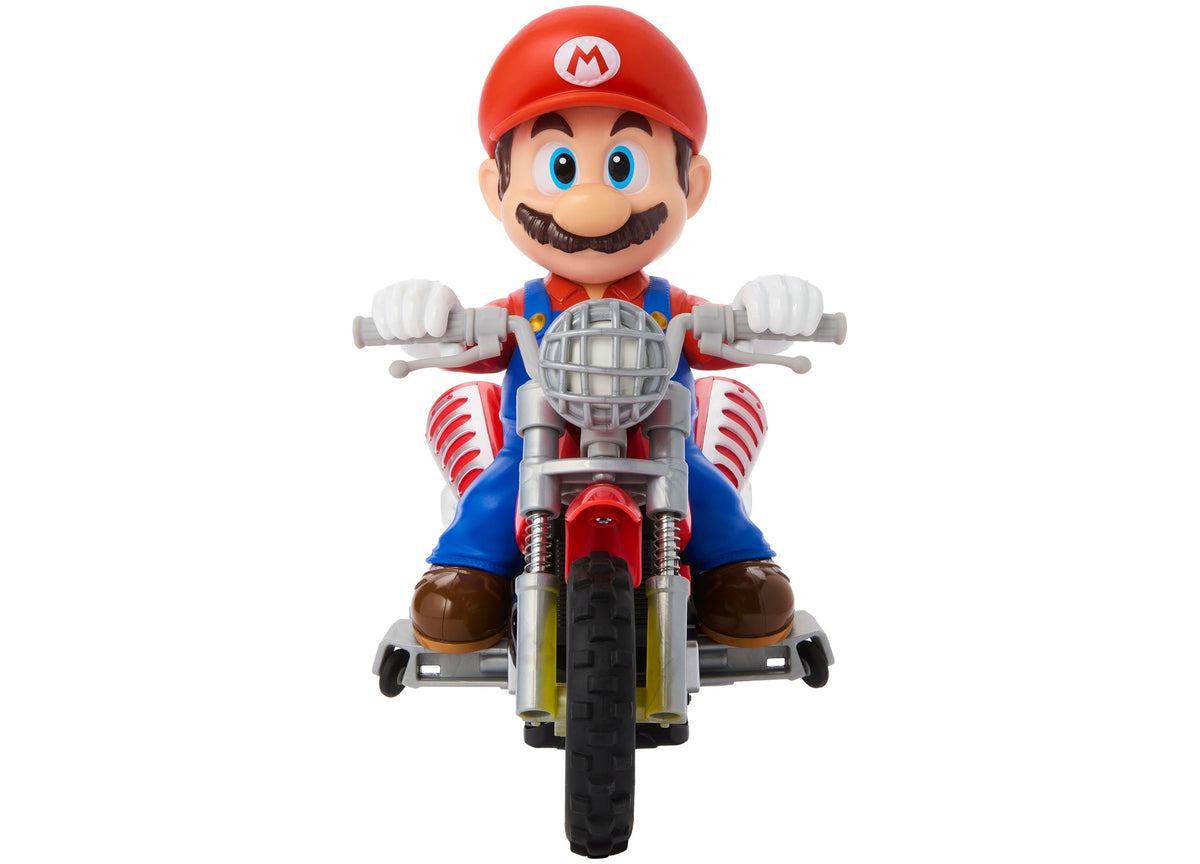 Hot Wheels Mario Wheelie Motocross RC Vehicle with Mario character in red cap and blue overalls on red and white moto...