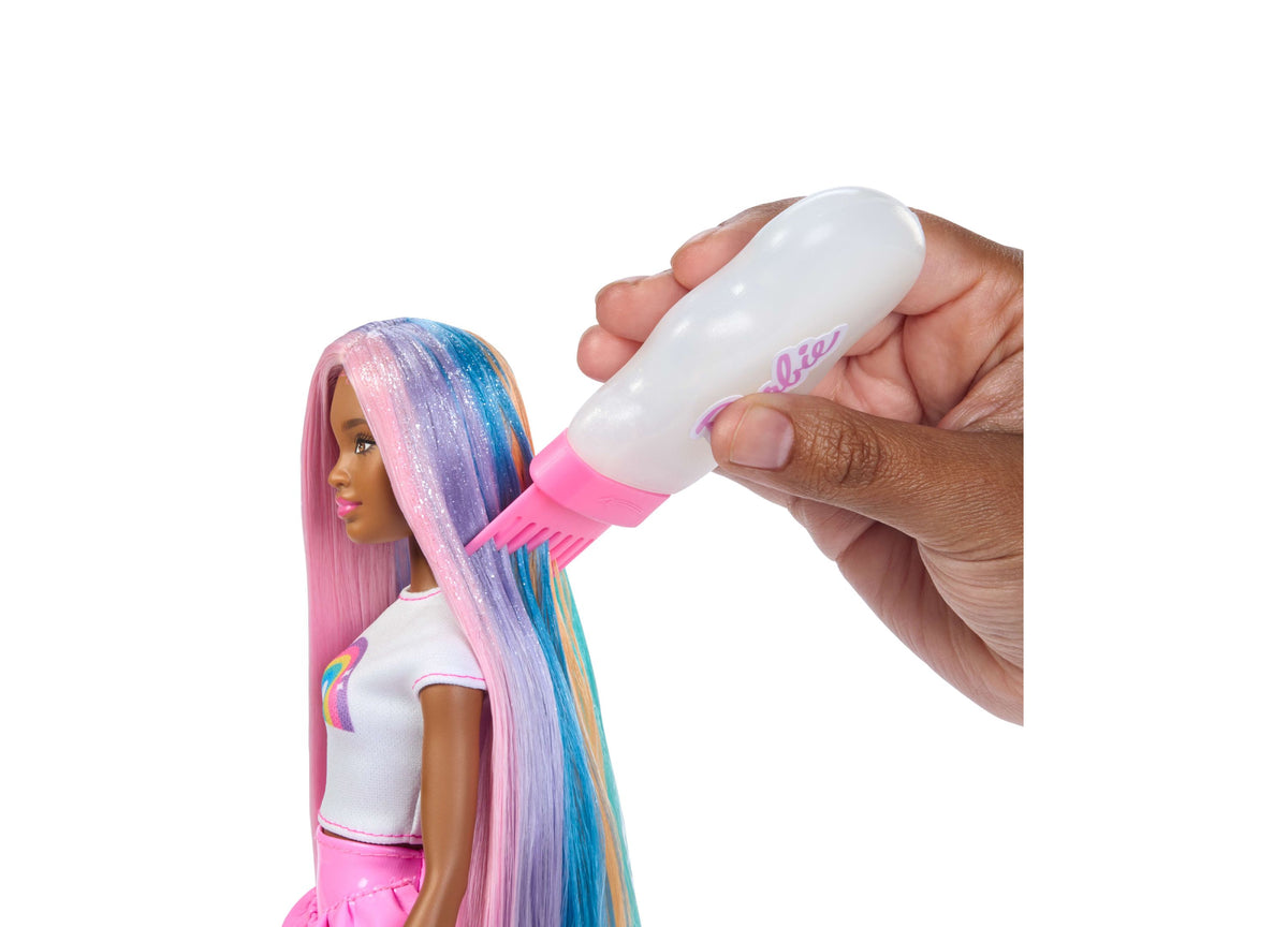 Barbie Rainbow Sparkle Hair Fashion Doll with pink, purple, and blue hair being styled with glitter comb accessory