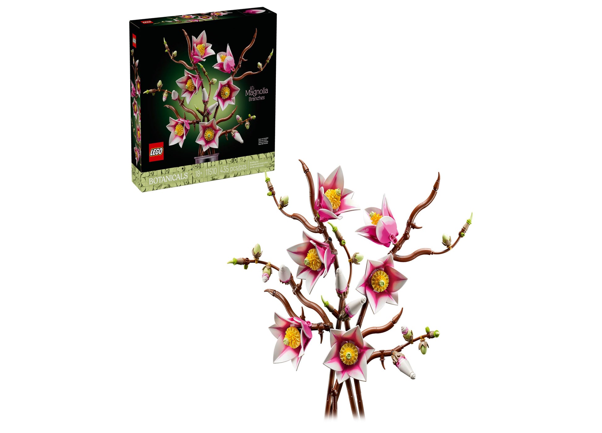 LEGO Botanicals Magnolia Branches building set with pink and white flowers on brown branches, shown assembled next to box packaging