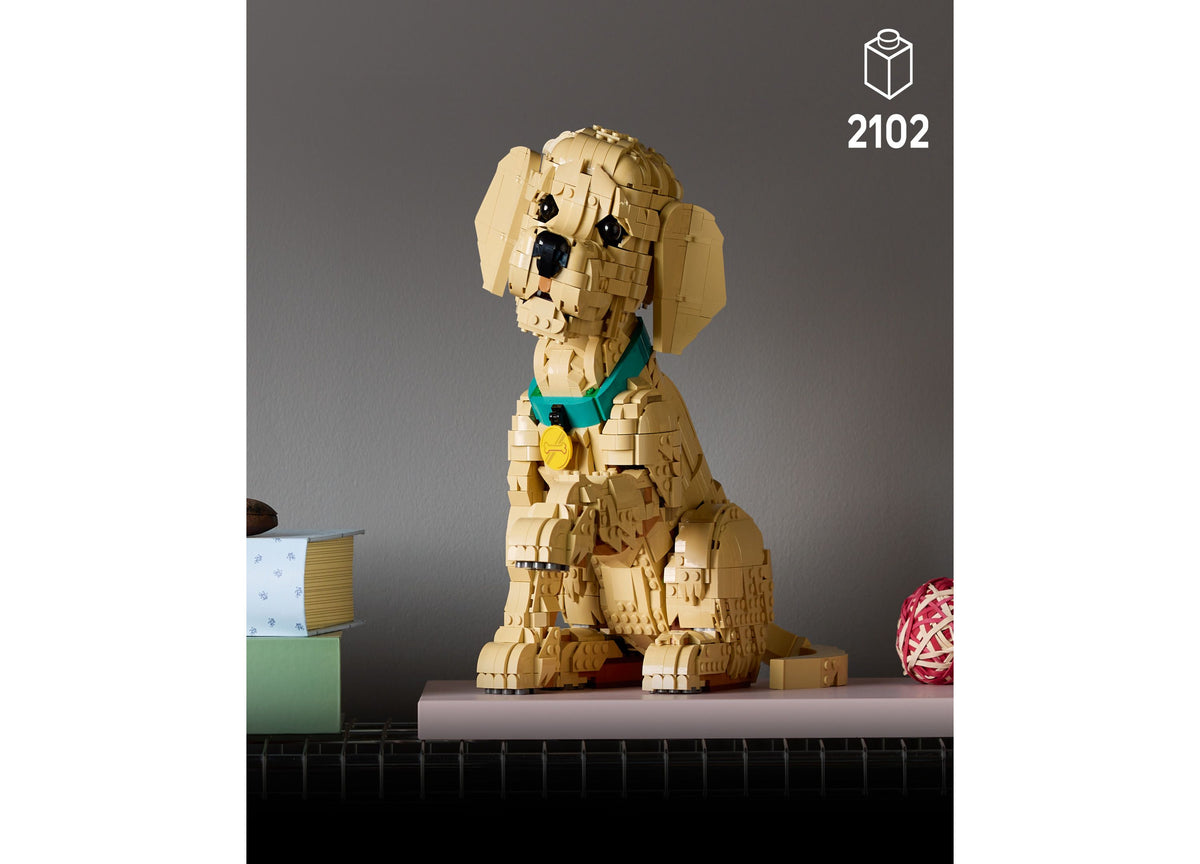 LEGO Icons Golden Retriever Puppy Building Set 2102 Pieces - tan posable dog figure wearing teal collar with yellow t...