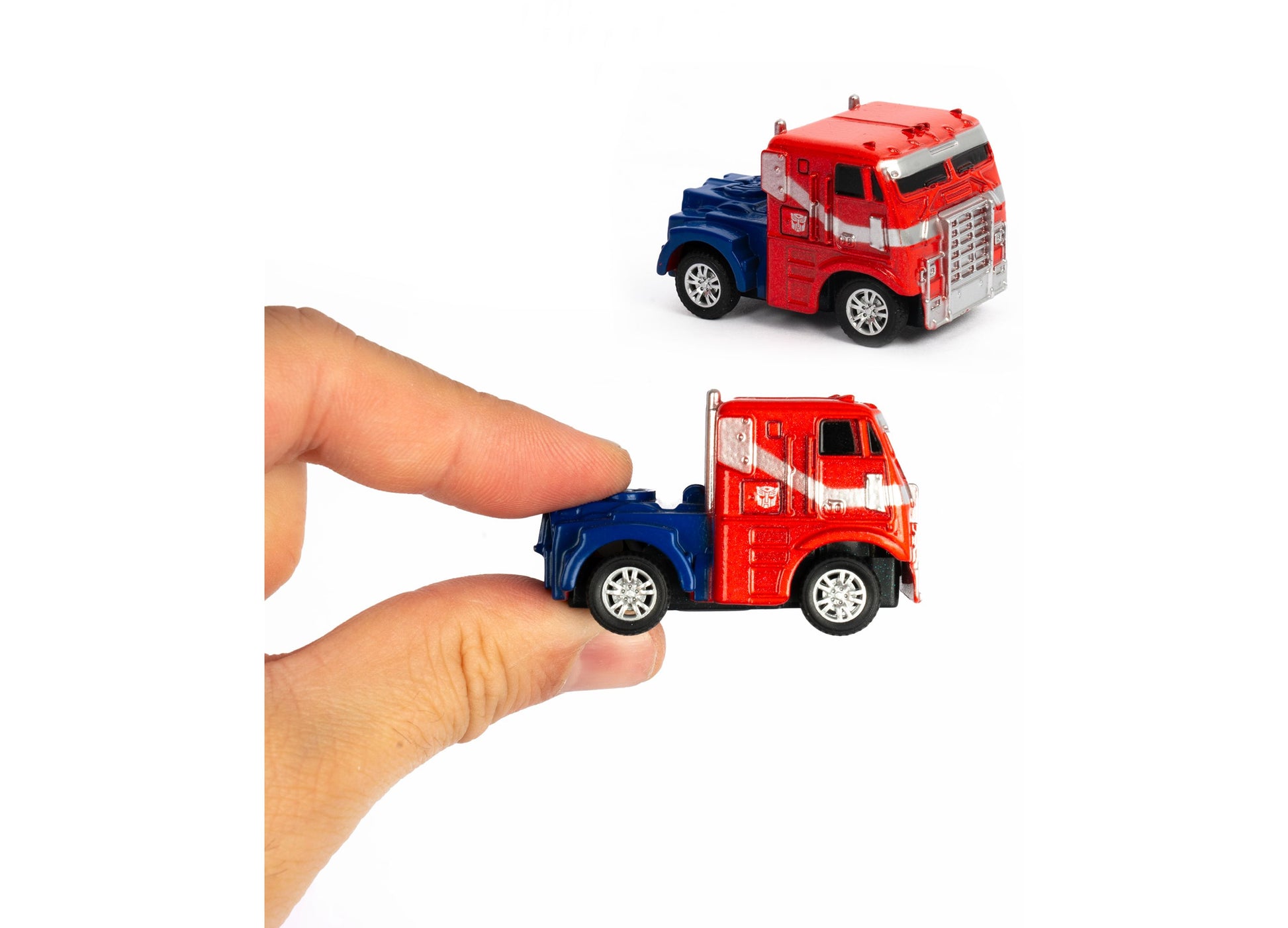 World Tech Toys Transformers Wrist Case Mini RC Truck Optimus red and blue toy in hand