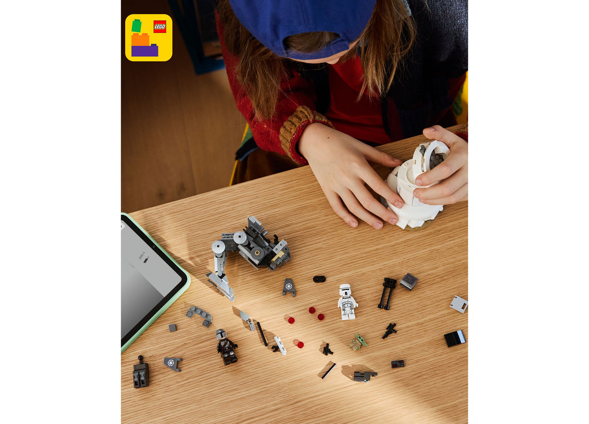LEGO Star Wars AT-RT Attack Building Set with posable walker, defense tower, and minifigure displayed on table