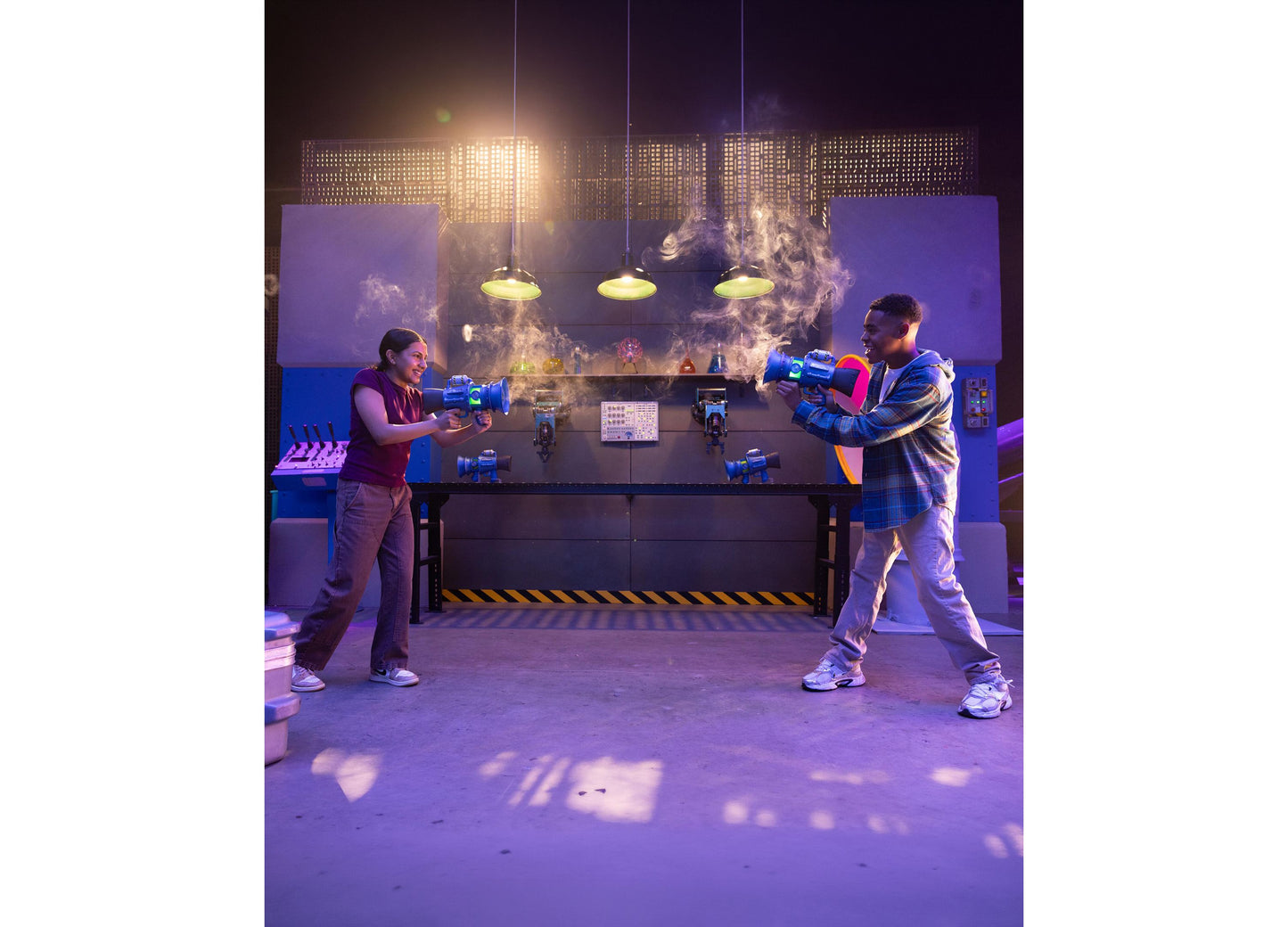 Despicable Me Minions 3 Supreme Fart Blaster toy guns in blue, held by two children in interactive play