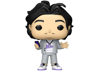 Funko POP vinyl figure with black wavy hair, gray suit, purple and white shirt, holding blue phone, arms spread wide, purple and white sneakers