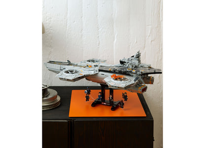 LEGO Marvel S.H.I.E.L.D. Helicarrier 76354 set with gray aircraft carrier, minifigures, and orange display base