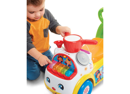 Fisher-Price Little People Music Parade Ride-On with colorful light-up keyboard, red drum, and removable trumpet