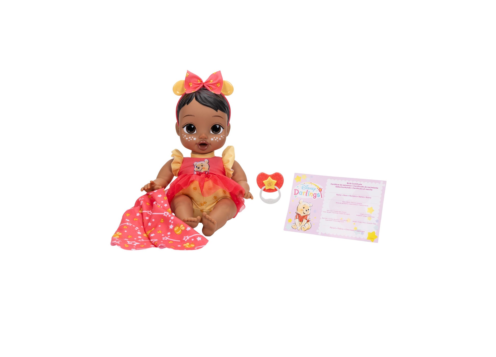 Disney Darlings Snuggly Stars Pooh Doll with red bow, gold ears, and star-patterned blanket