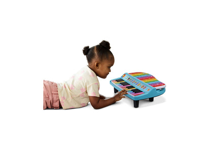 Leapfrog Twinkle Lights Learning Piano in blue with colorful keys, toddler playing