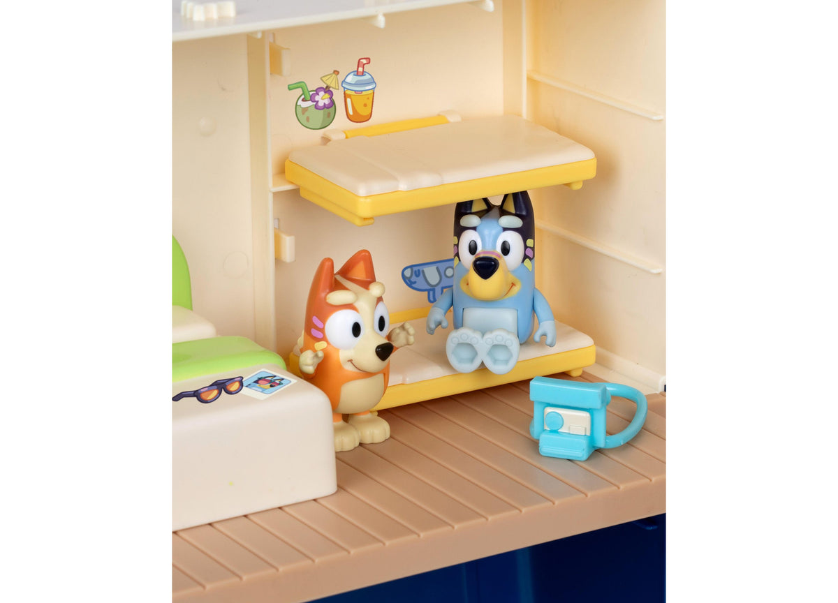Bluey Cruise Ship 13-Piece Playset with blue and orange dog characters, yellow deck levels, and accessories including...