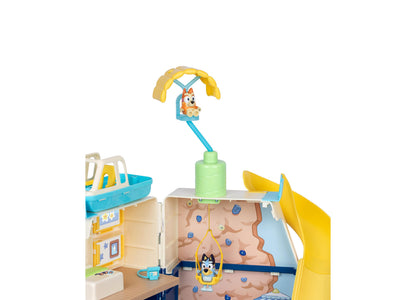 Bluey Cruise Ship playset with 6 play areas, featuring blue and yellow ship design, characters, and accessories