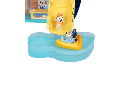 Bluey Cruise Ship playset with yellow tower, blue water base, orange character figure, and yellow boat accessory