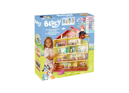 Bluey's Light & Surprise Heeler House playset with multi-level home, colorful rooms, and character figures