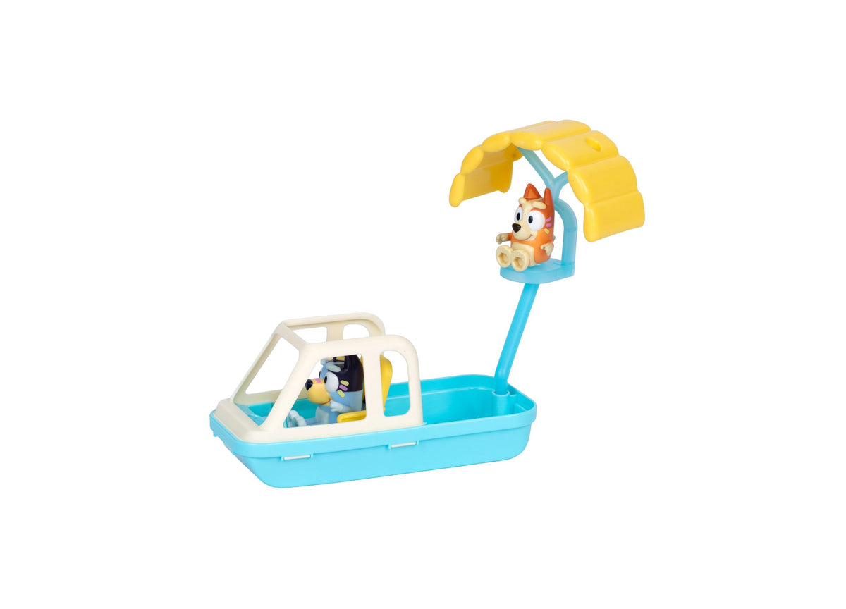 Bluey Cruise Ship playset with blue boat, white cabin, yellow canopy, and character figures