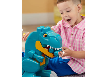 Mega Bloks Fisher-Price Build & Chomp Dinosaur set with turquoise T-Rex featuring opening mouth and yellow details